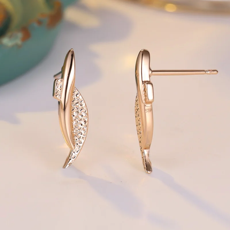 2026 New European and American Niche Design Curved Blade Earrings with Metal Concave Convex Texture Long Leaf Accessories