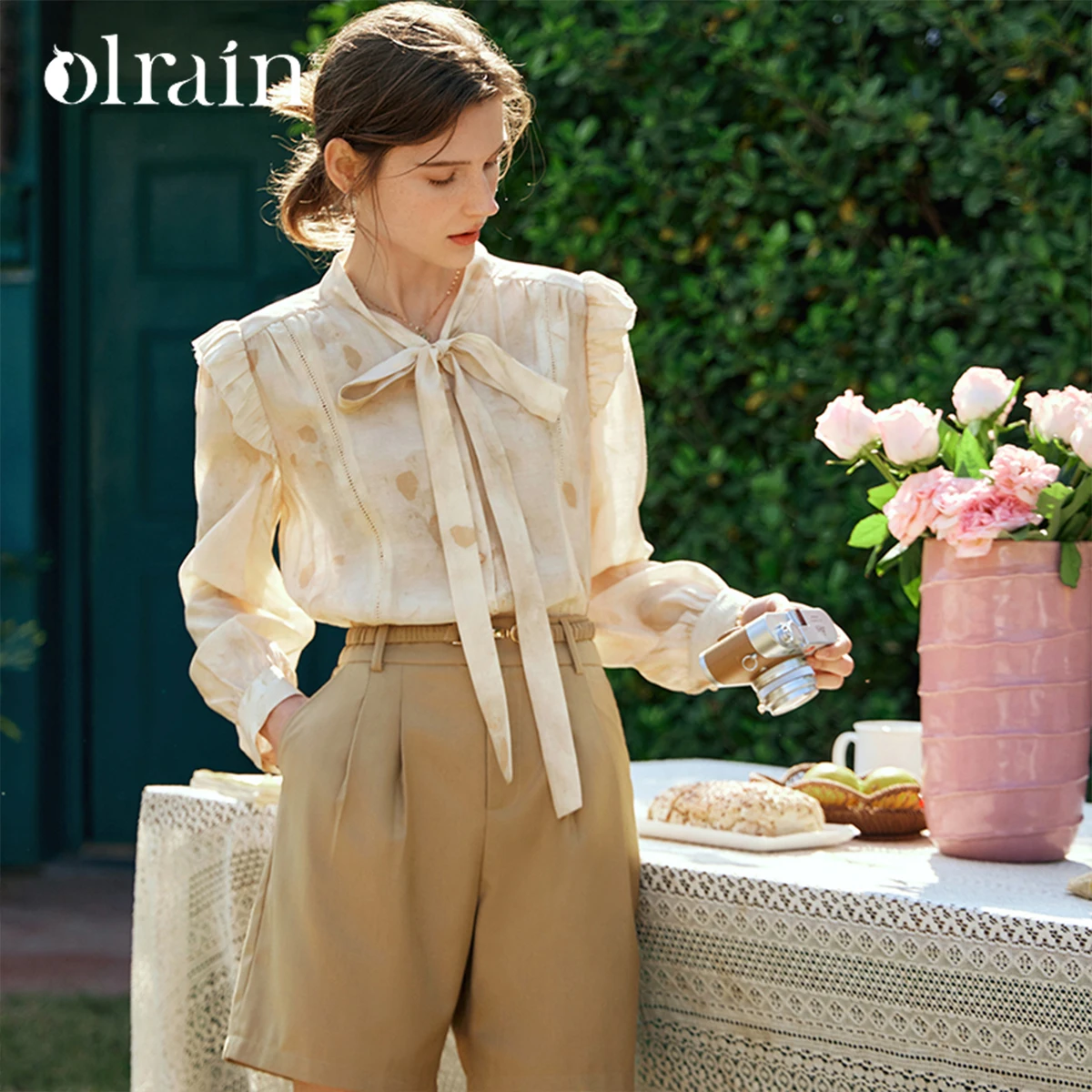 

OLrain Ribbon Collar Women Shirts 2026 Autumn ModaL Ruffled Sleeve Chic Button Print Elegant Blouses Tops Female O24CC90320