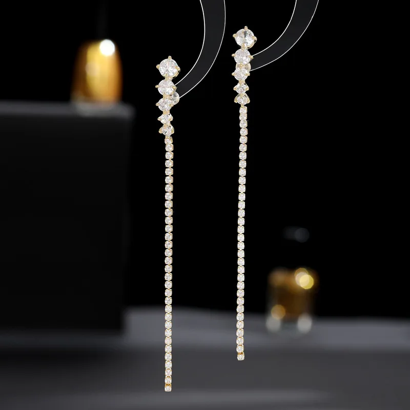 

925 Silver Needle ear Stud with a niche design sense, featuring super flash zircon inlaid geometric arc-shaped line earrings
