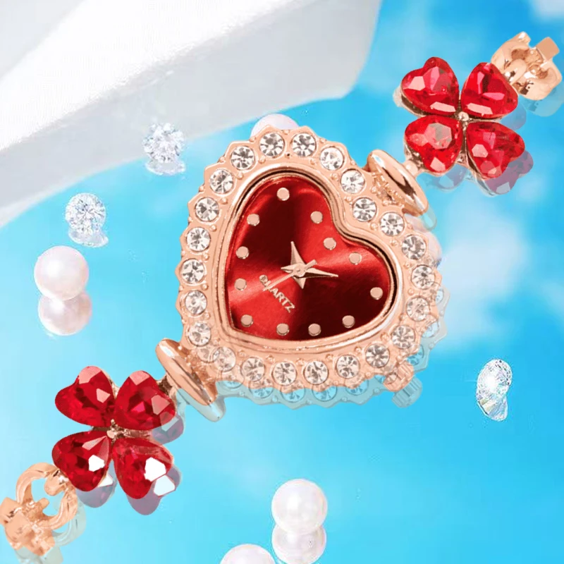 

A women's rose red steel strap simple fashion four-leaf clover peach heart quartz watch