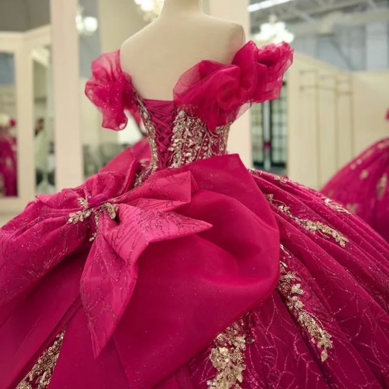 ชุดเดรสงาน Quinceanera สีชมพูโรสบลัช ประดับลูกไม้ คริสตัล ดอกไม้ 3 มิติ ผ้าทูลล์ กลิตเตอร์ โบว์  ชุดเดรสสำหรับงาน Quinceanera อายุ 15 ปี ﻿ ปรับแต่งได้