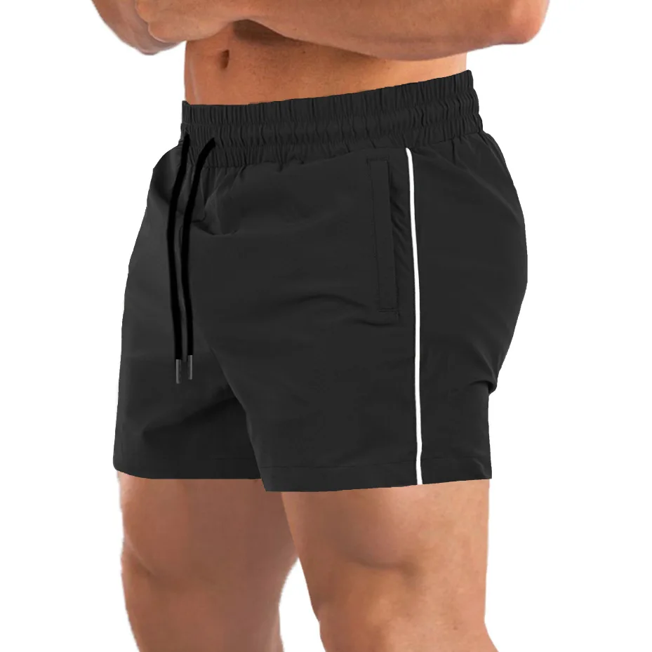 

Muscular men's sports fitness shorts stretch thin fitness dog breathable squat three-point pants quick-drying running shorts