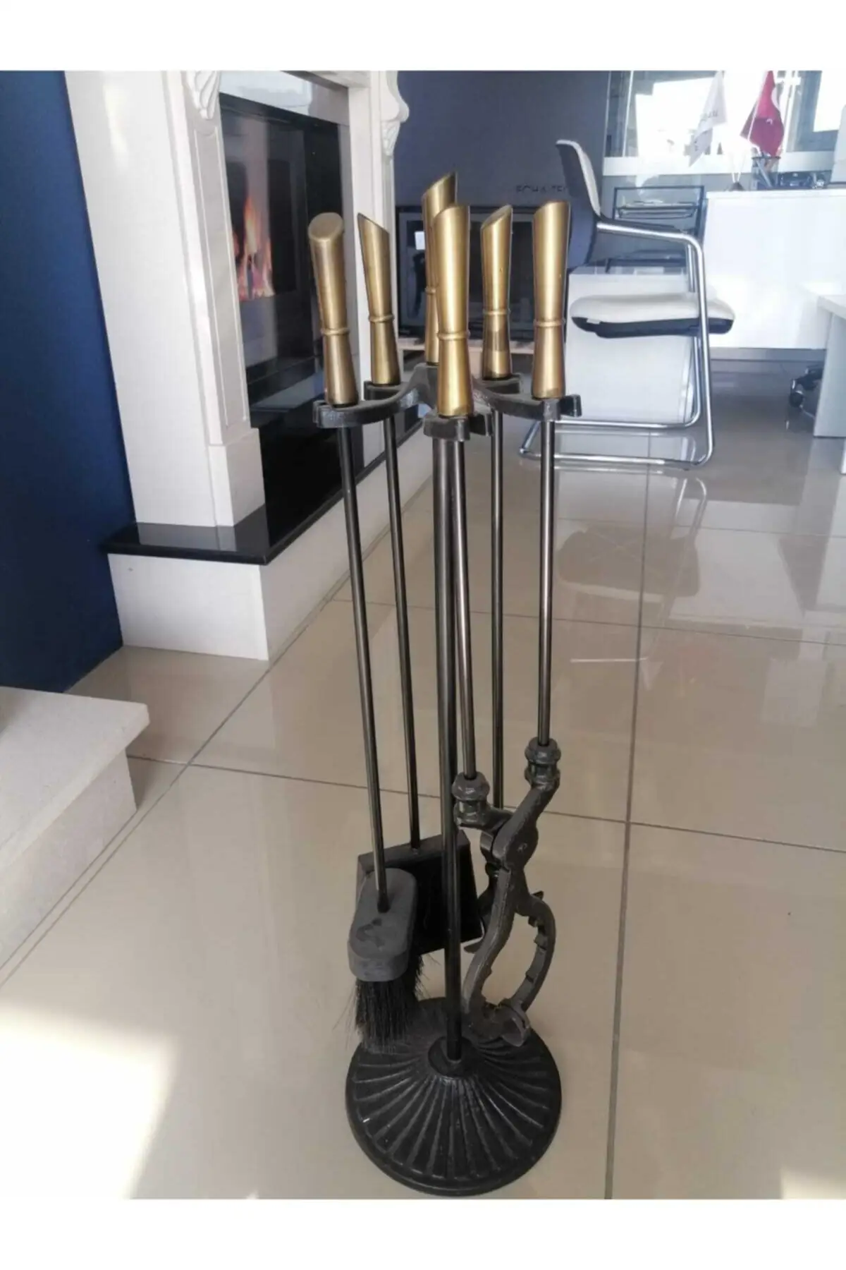 Pieza de chimenea Tong Team