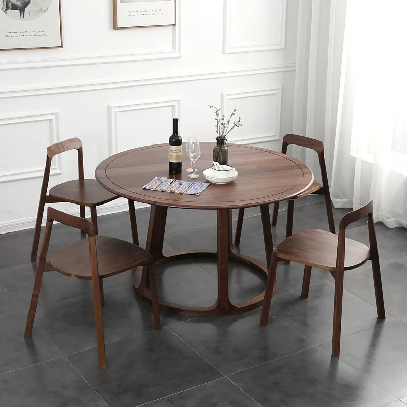 Mesa de jantar redonda de madeira maciça de nogueira preta norte-americana nórdica moderna e simples mesa de jantar e cadeiras domésticas pequenas separadas