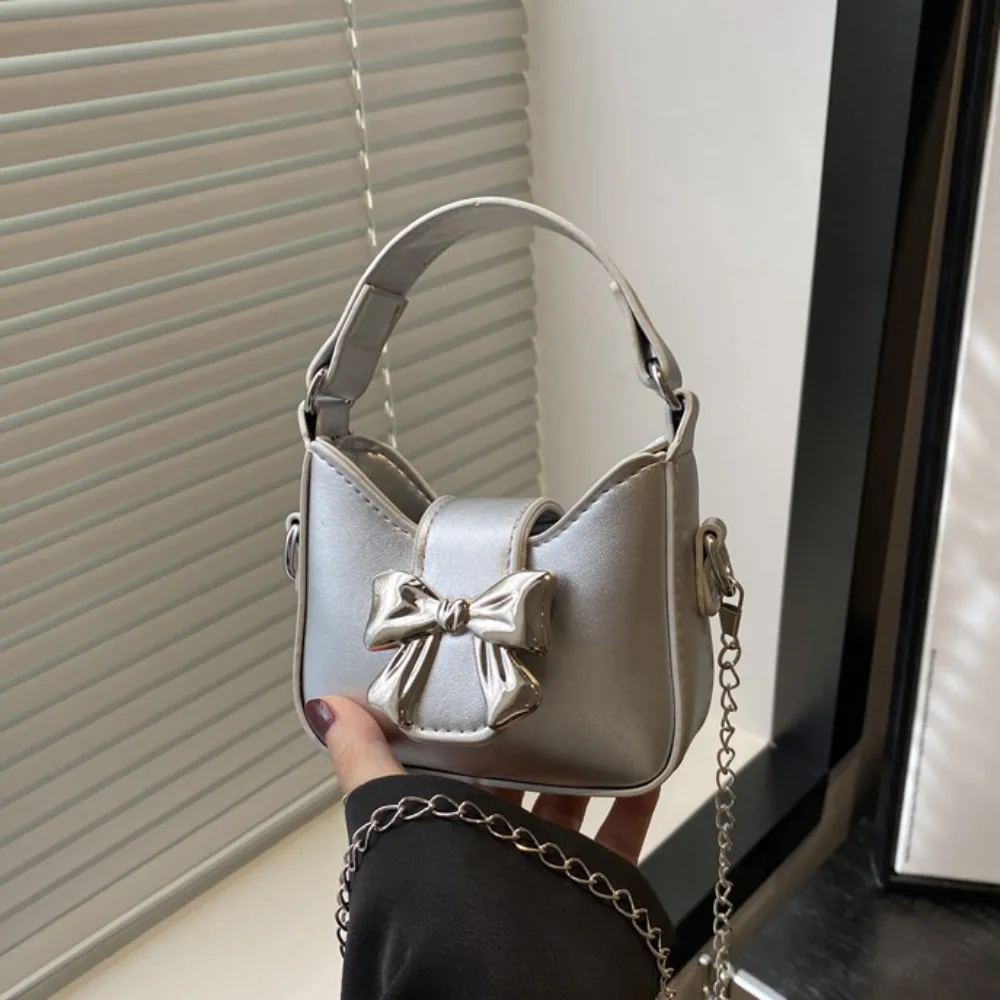 

Pu Leather Bow Buckle PU Bag Handbag Mini Silver Bucket Bag Solid Color Korean Style Women's Shoulder Bag Storage phone