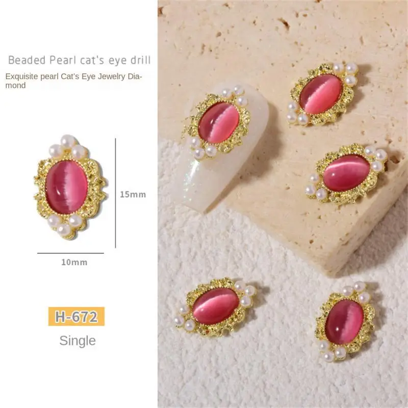 Białe akcesoria do zdobienia paznokci Wysokiej jakości perłowe wiertło do paznokci Przyciągające wzrok modna biżuteria ze stopu kociego oka Akcesoria do paznokci