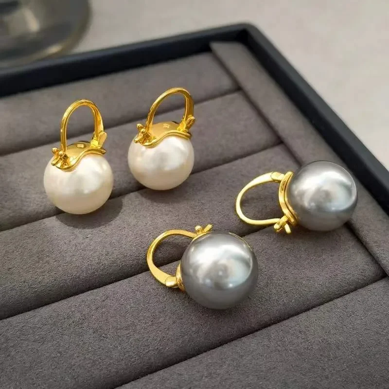 2024 S925 silver earrings high-brightness texture Shijiao white pearl earrings fringed premium stud earrings women's retro