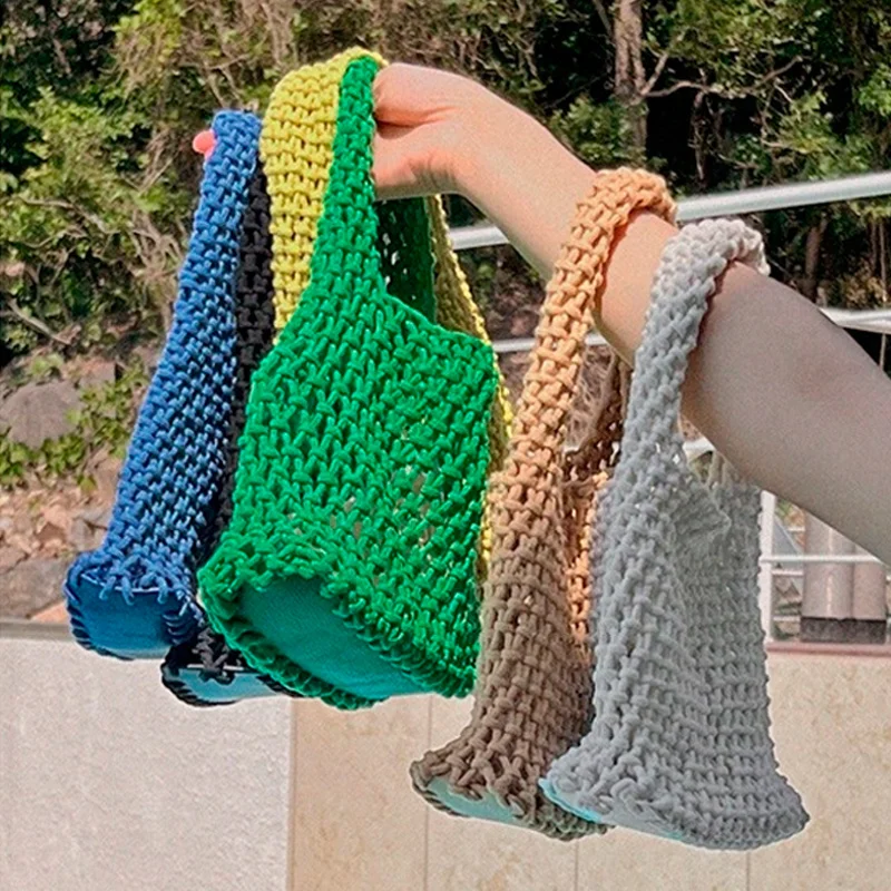 

Korean Hand-woven Hollow Handbag Mori Cotton Thread All-match Fashion Net Pocket Lazy Wind Fishing Cabbage Basket