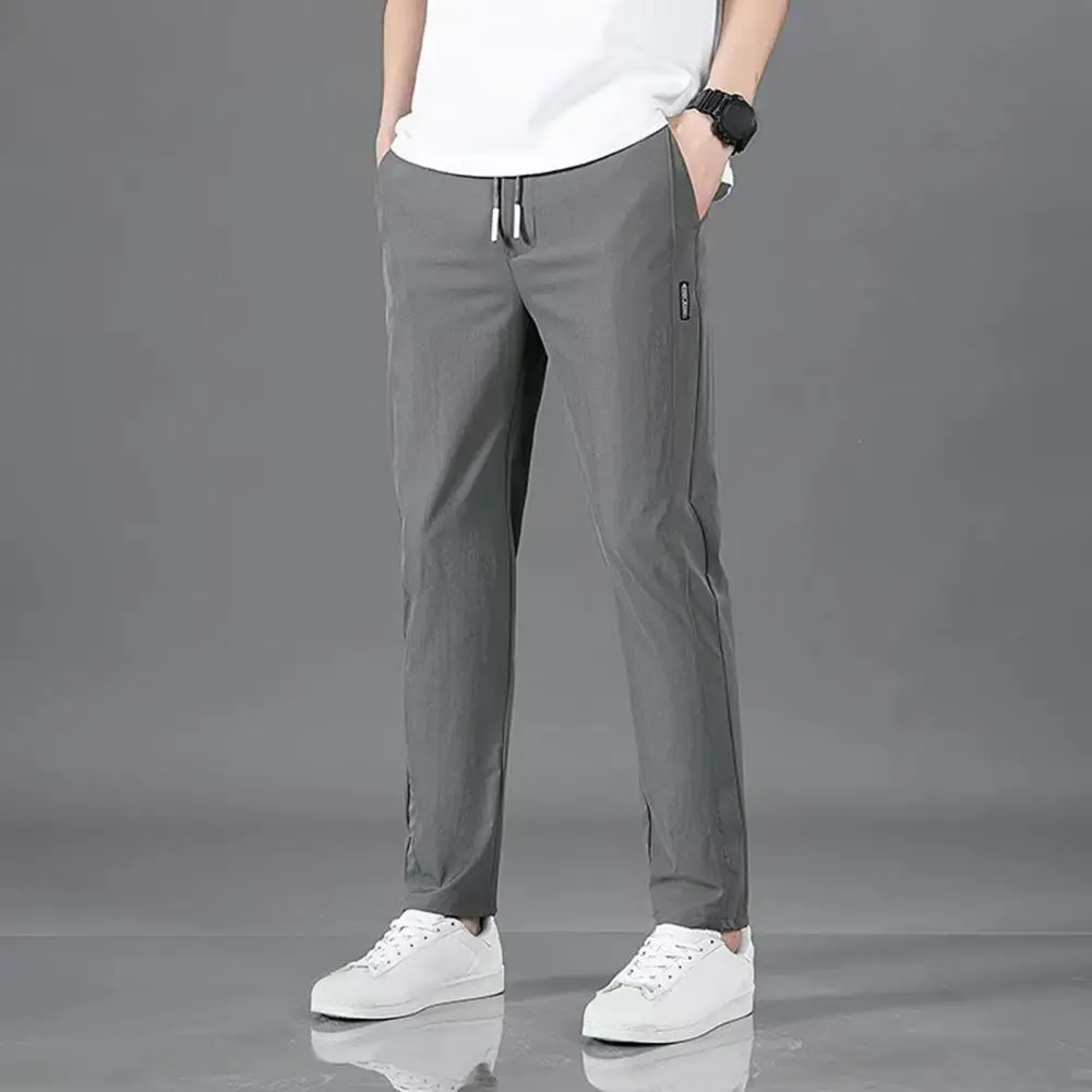 Ice Silk Casual Pants Slim Fit Quick Dry Men's Gym Training Jogging Sweatpants with Elastic Waist Side Pockets Solid Color Long