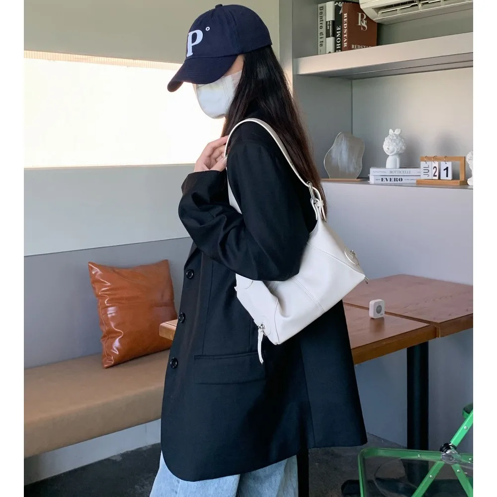 

New women's bag cool pull girl niche design fashion leather zipper single shoulder hand underarm retro small bag woman