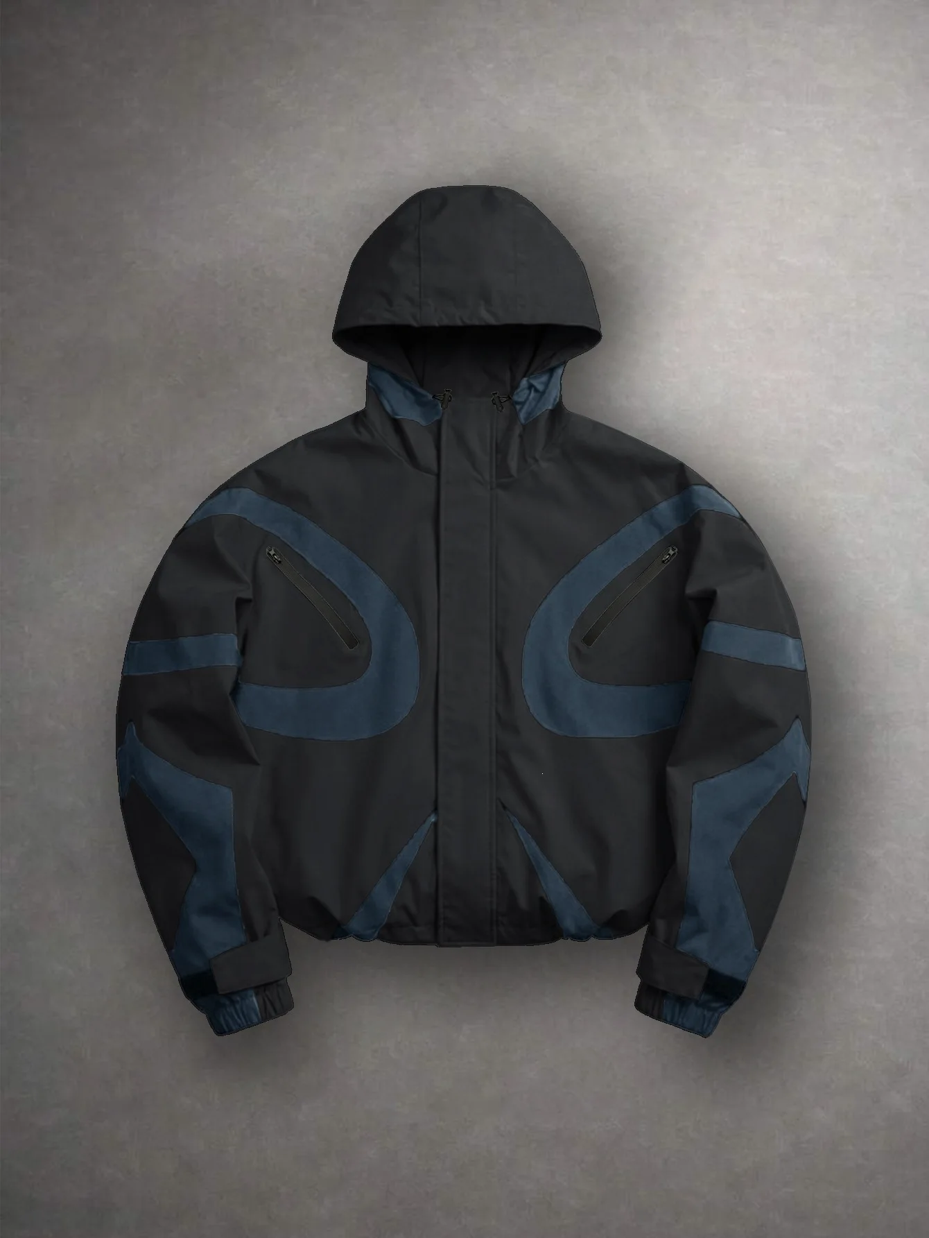 Color-blocked Paneled Utility Hoodie With Curved Detailing Waterproof Hooded Hardshell For Outdoor Use