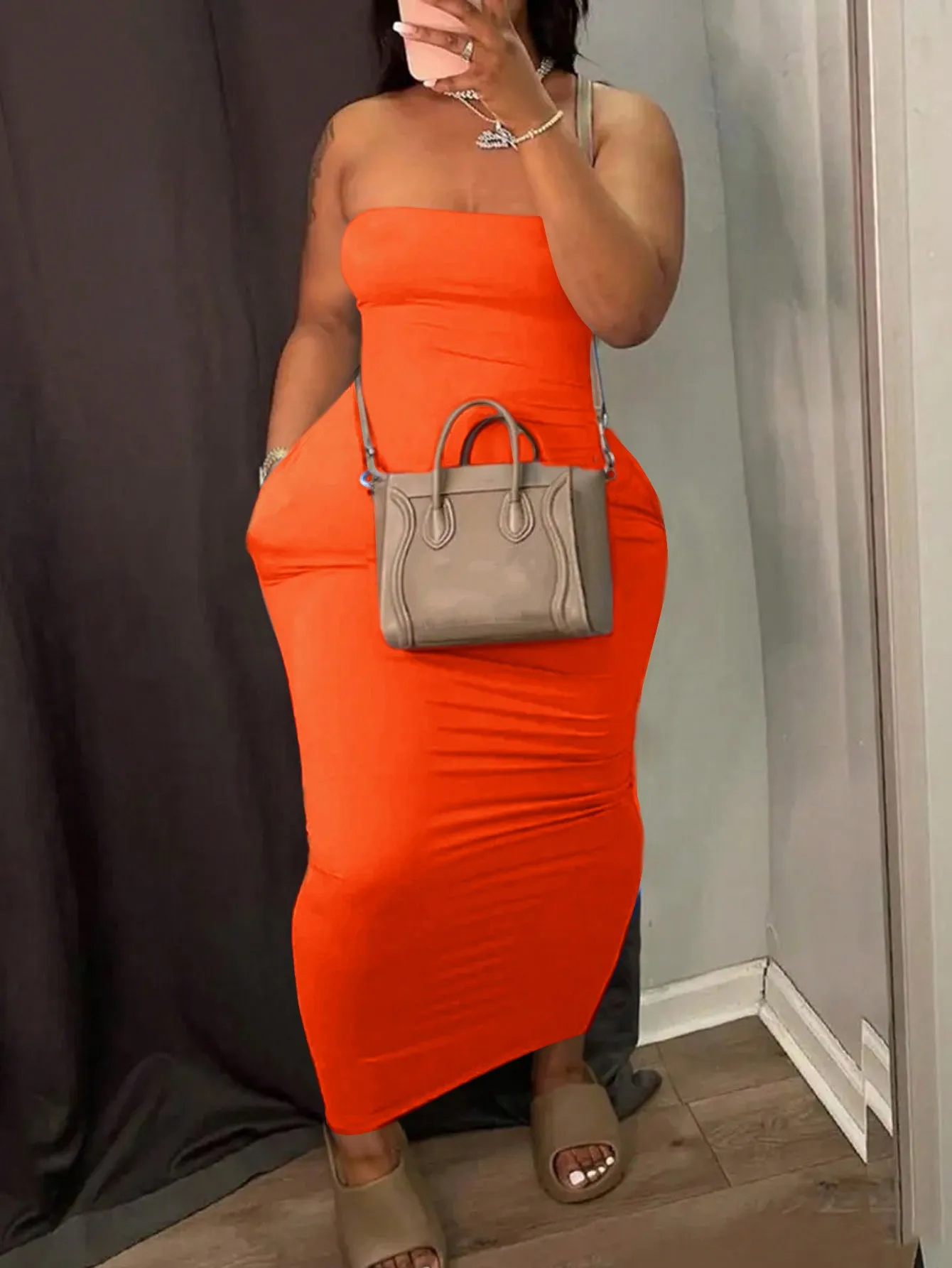 

Plus Size Solid Orange Strapless Bodycon Dress with Pockets