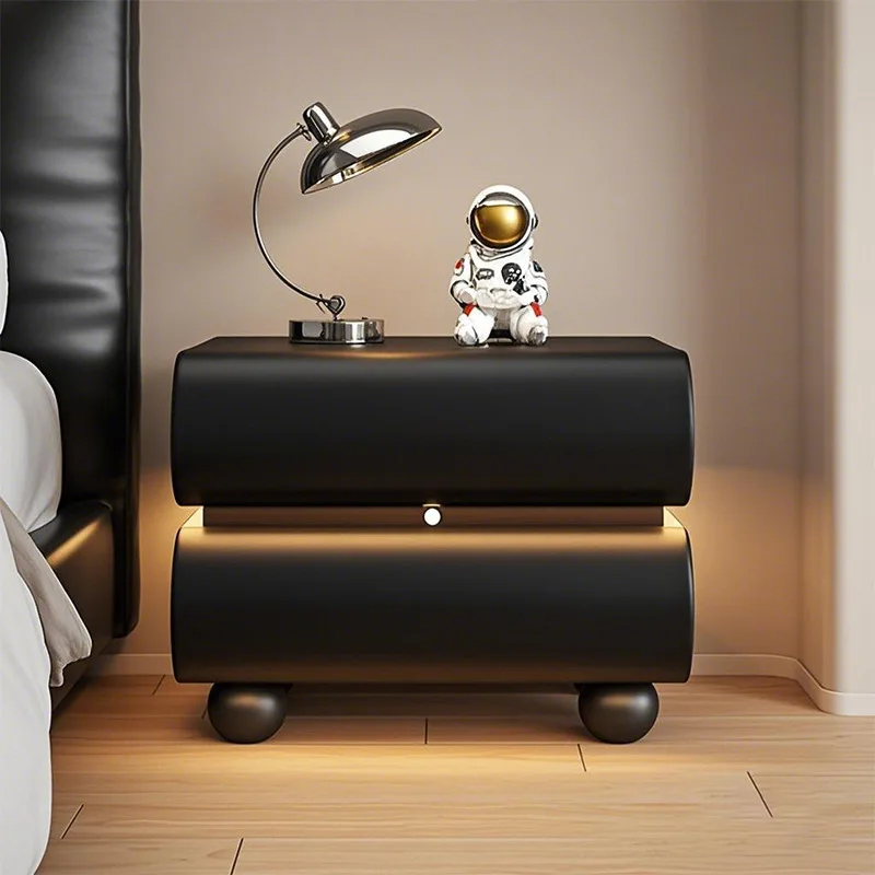 

Simple and modern solid wood cream wind bedside table Italian minimalist light luxury high-end black leather storage cabinet