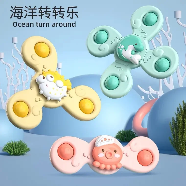 

Children's suction cup spinning toy ocean dinosaur spinning toy baby bath and water play fun bell ringing fidget spinner metal