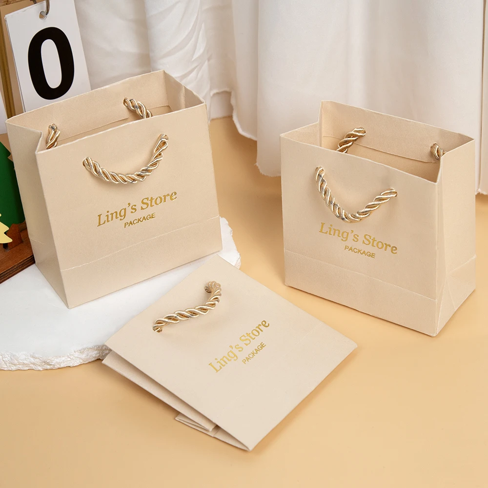 

20/50/100Pcs Personalized Logo Beige Jewelry Paper Handle Bag Small Gift Packaging Pouch Wedding Rings Necklace Storage Handbags