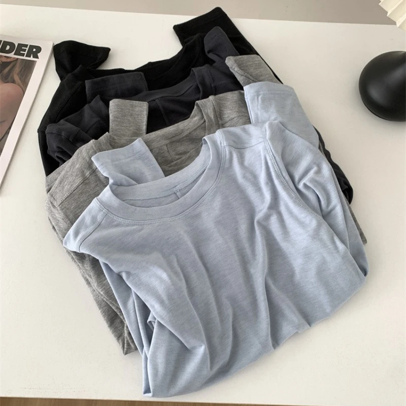 Camiseta de manga larga con empalme de lana de seda para mujer, Tops informales a la moda con cuello redondo, Top fino suave y ceroso con respaldo de Color sólido para primavera y verano