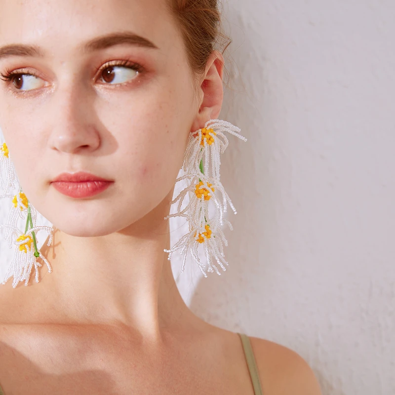 Hand-beaded long earrings Exaggerated white Daisy petals fringe earrings for female niche temperament holiday style earrings