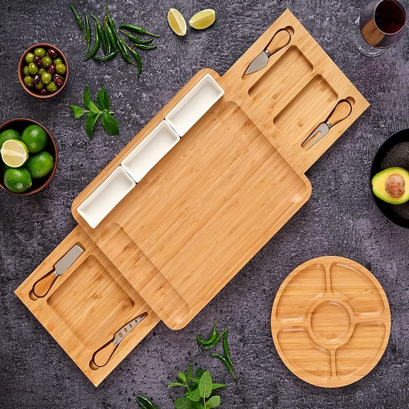 Natural Bamboo Cheese Board and Knife Set Charcoal Board Set is a cheese, meat, biscuit serving tray