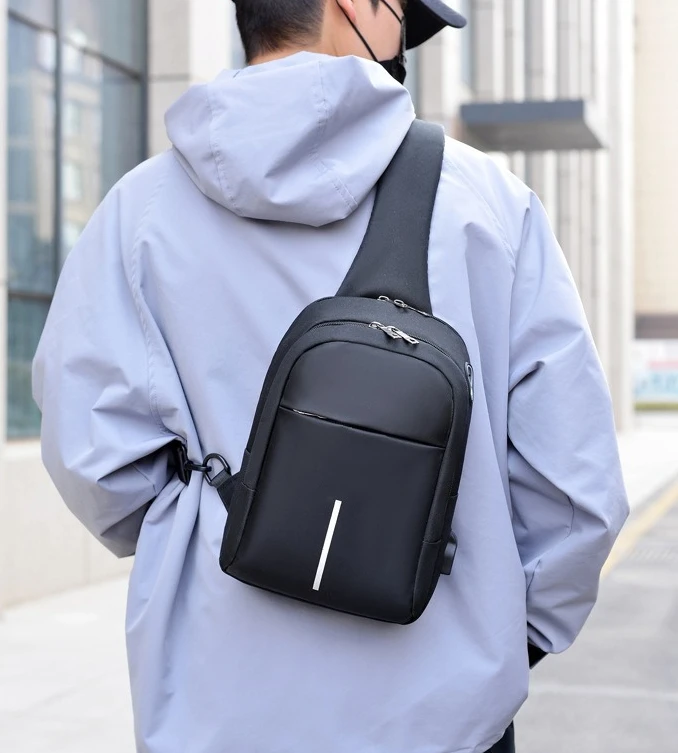 New Casual Men's Chest Bag, Portable Charging Headphone Jack Crossbody Bag, Water-resistant and Multi-purpose Single-shoulderbag