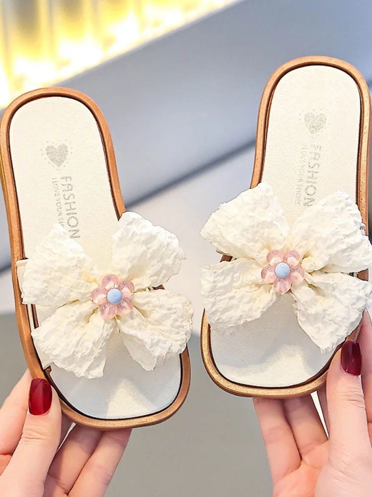 

Тапочки на плоской подошве для девочек, стильные и милые летние сандалии с открытым носком, повседневные пляжные тапочки для отдыха.