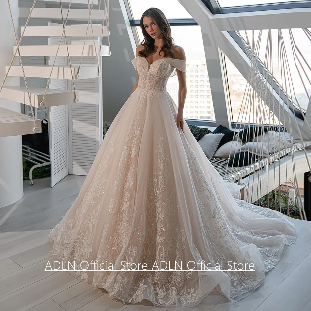 Ballkleid-Korsett-Hochzeitskleid nach Maß, schulterfrei, herzförmig, durchsichtig, mit Pailletten und Spitzenapplikationen, Brautkleider