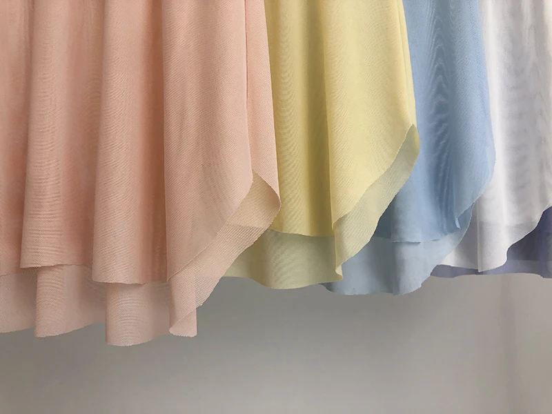 Saia de Dança de Balé Fena, Saia Curta com Cintura Elástica, Efeito Emaecimento e Alongamento das Pernas, Malha com Ilh...