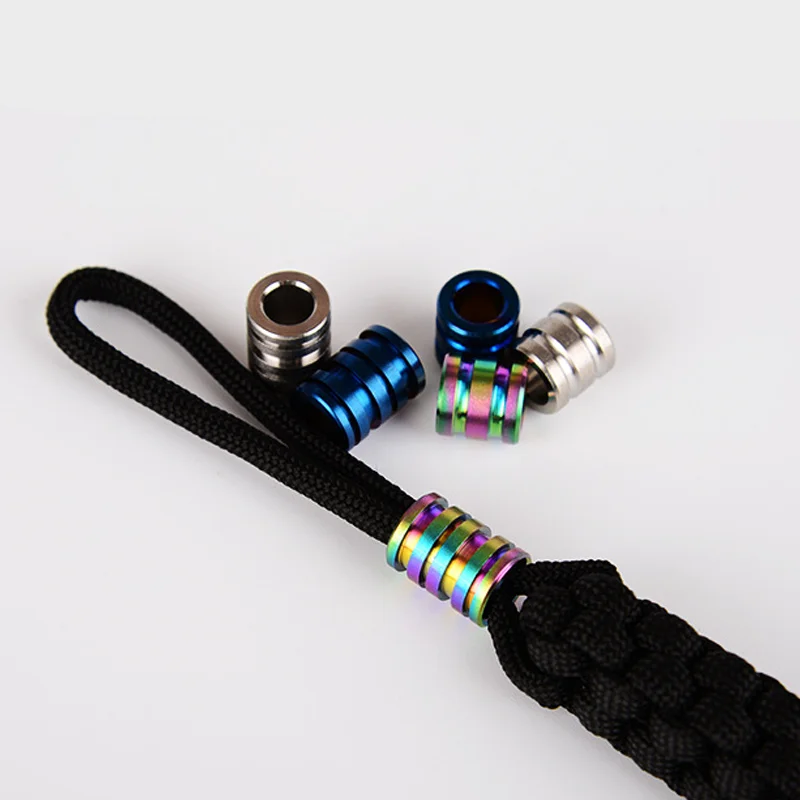 

Titanium Alloy Knife Beads Rope Cord EDC Paracord Bead Pendant EDC Fidget Spinner Push Slider DIY Accessories Fidget Slider Bead