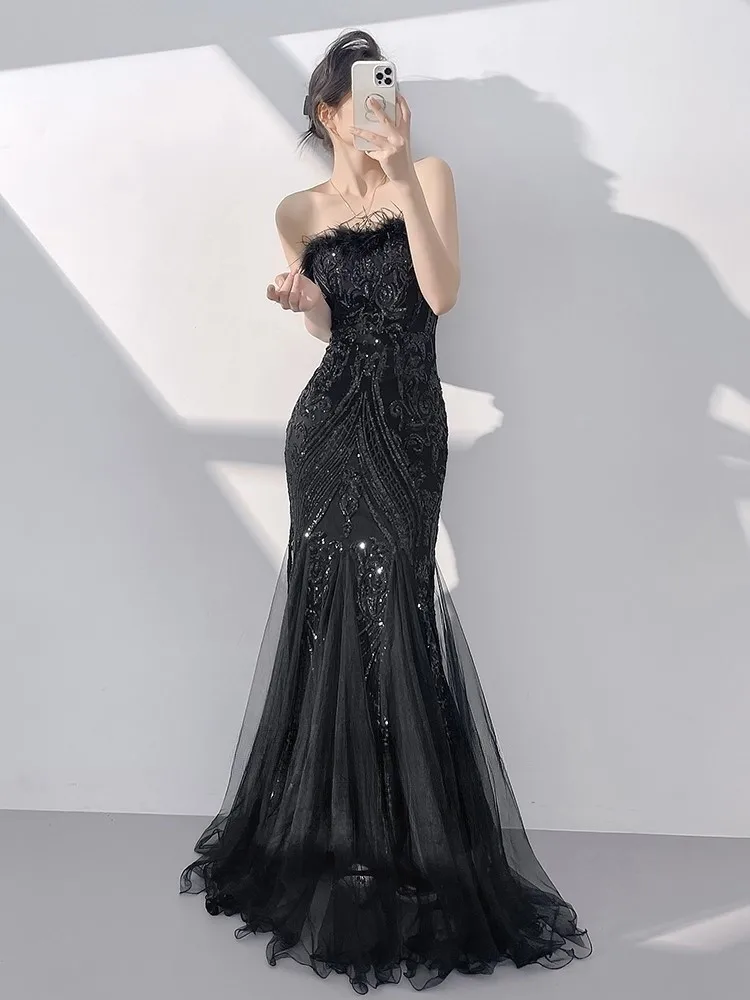 

Black banque-themed strapless sequined tulle host fishtail dress