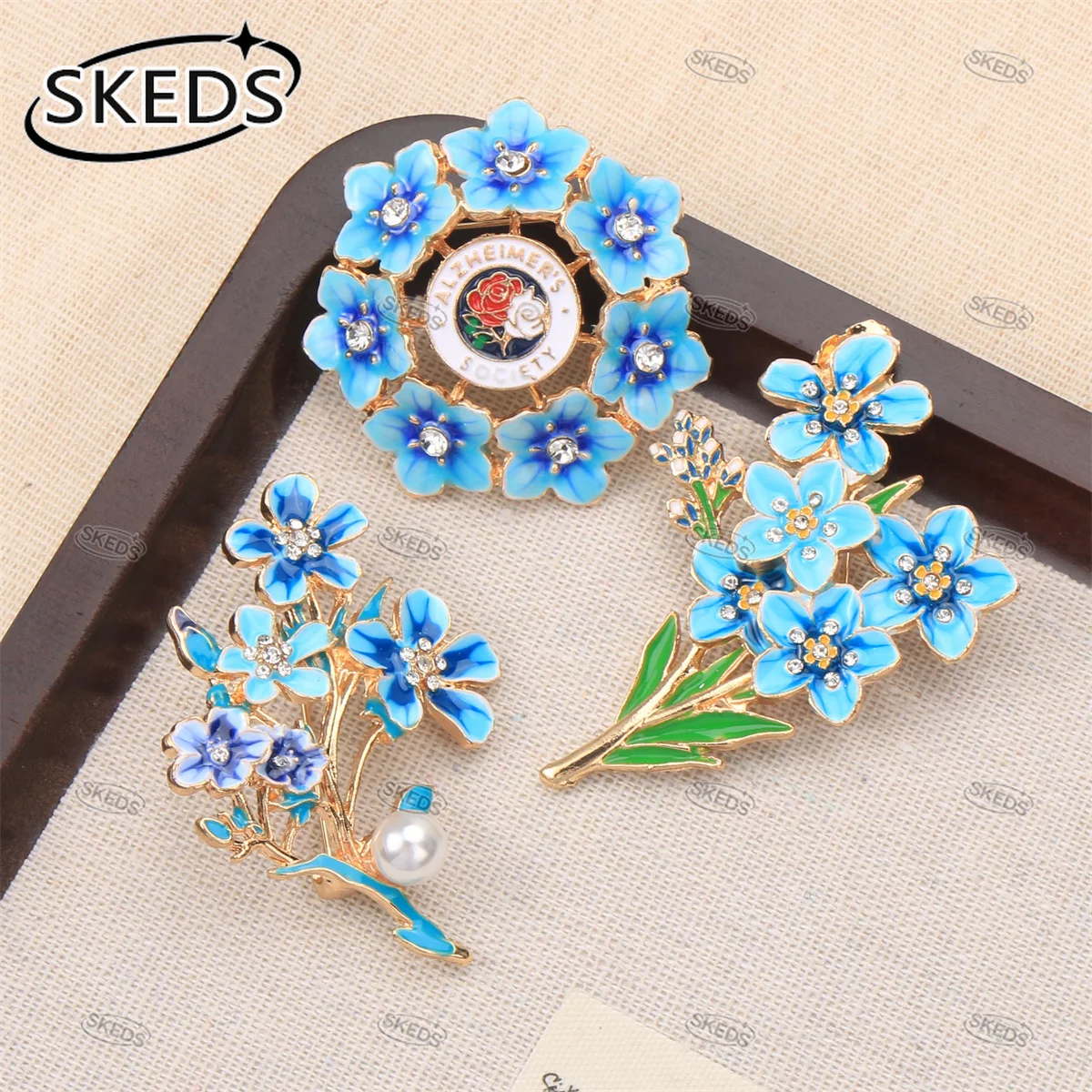 SKEDS Forget Me Not Blue Flower Enamel Brooch Rhinestone Pearl Floral Lapel Pin Badge for Women Suit Scarf Jewelry Gift