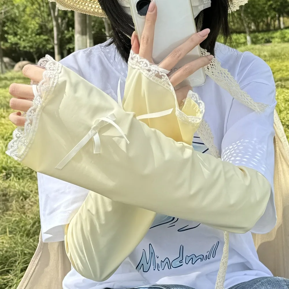 かわいいリボンアイスシルクアームスリーブ無地フレア日焼け止めアームスリーブ UV 保護大型サイクリングアームカバーレディース