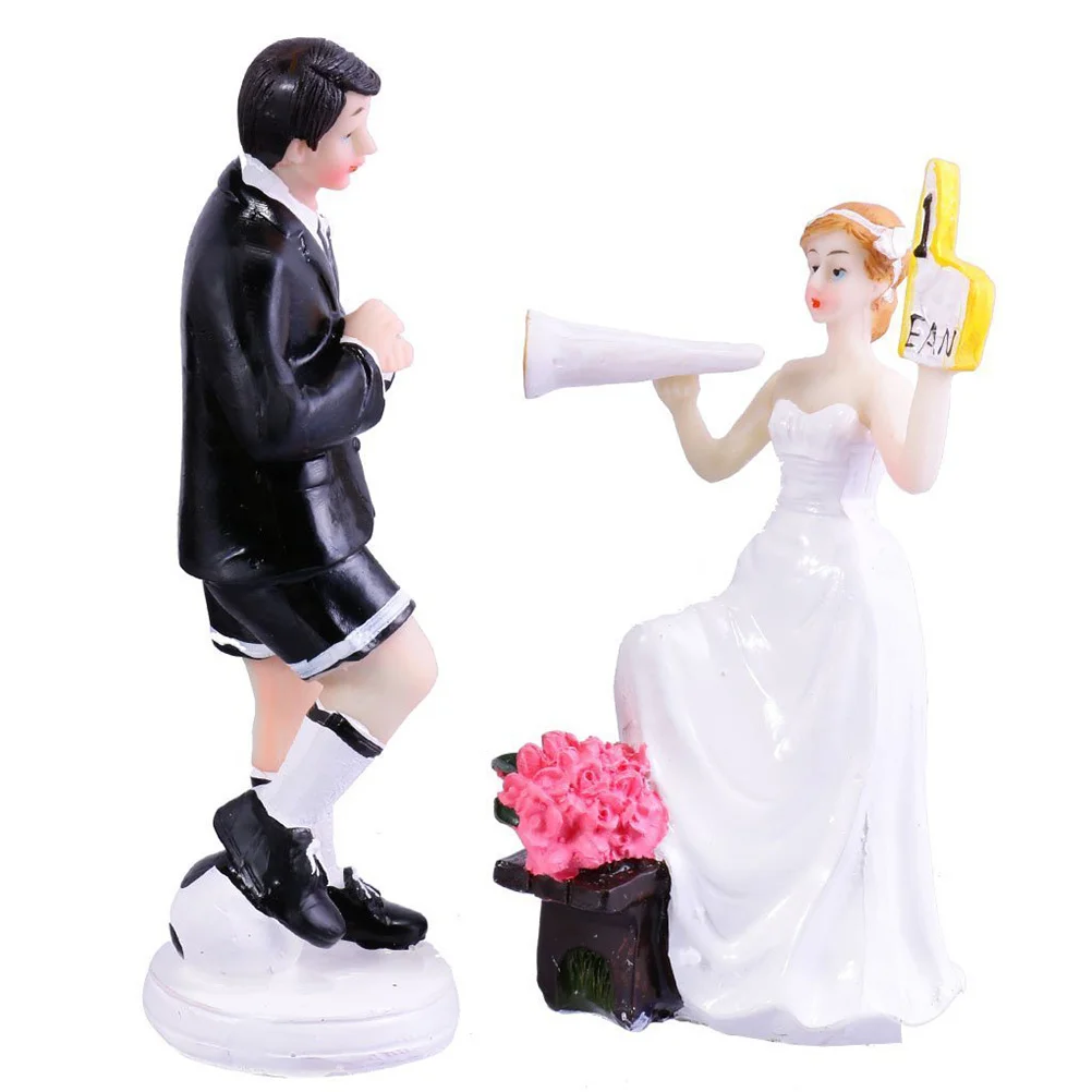 

Pair Soccer Theme Wedding Cake Topper Resin Bride Groom Figures Funny Groom Foot on Soccer Bride Holding Trumpet Board Wedding