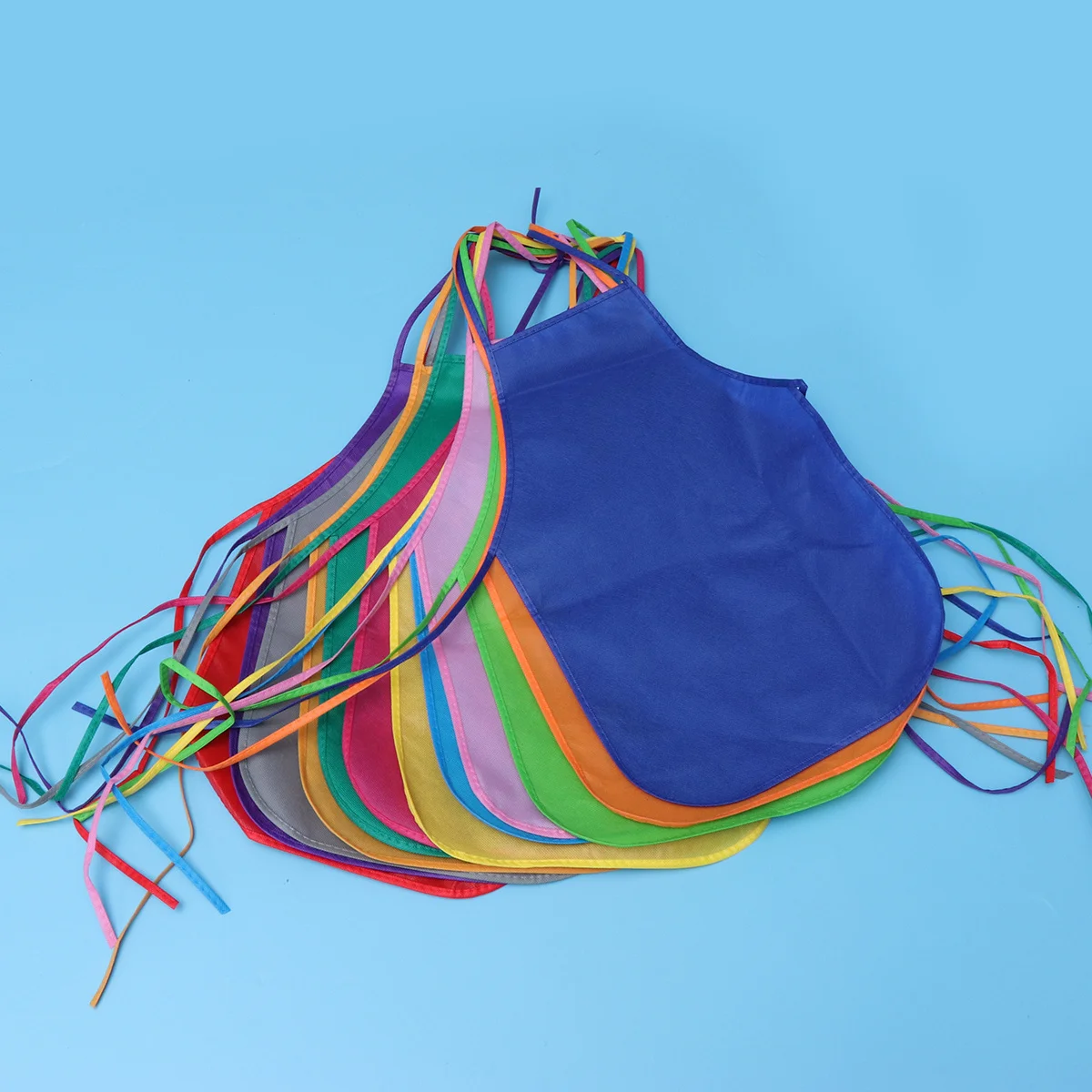 

12Pcs Children Artist Aprons Non-Woven Fabric Waterproof Painting Aprons for Kids Crafts Cooking Feeding Art Activities Random