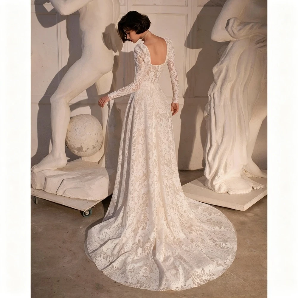 Customized Sexy Sweetheart A-line Decal Wedding Dresses 2026 Popular Long Sleeved Lace Backless Card Shoulder A-line Bridal Gown