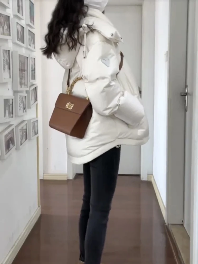 Blanco corazón aped ort Thiened down Jaet mujer invierno nuevo diseño tamaño pequeño abrigo coreano Sle corte recto viaje viento