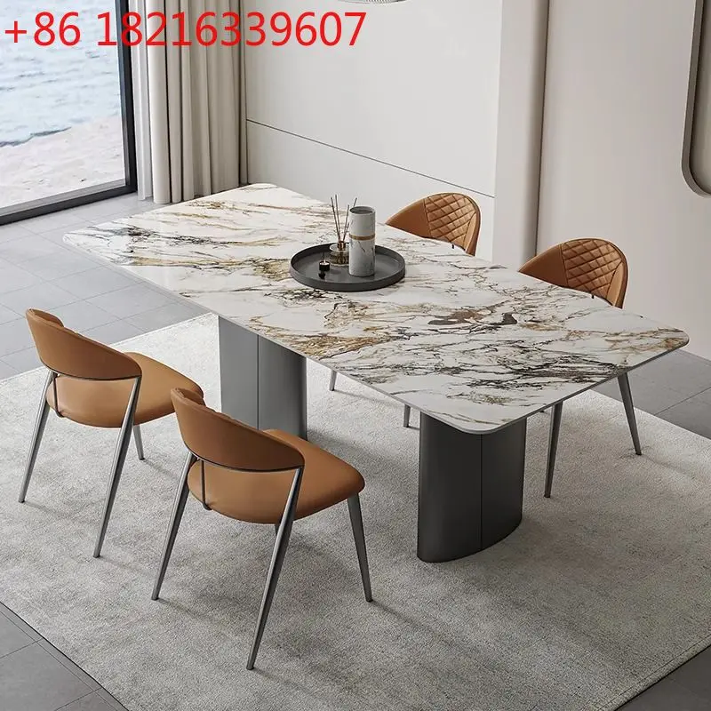 

Итальянский светлый роскошный импортный обеденный стол из яркой каменной плиты и комбинация стульев для небольшой квартиры и дома