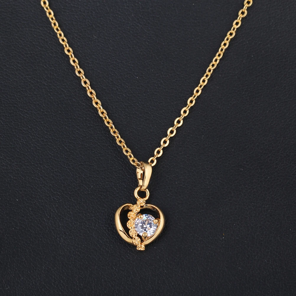 

Elegant Hollowed Heart Pendant Necklace in Gold Tone Fine Crafted Stainless Steel Smooth Surface Feminine Charm Timeless Design
