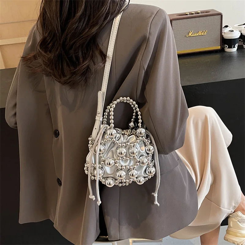 Bolsos de lujo con cuentas para mujer, bolsos de perlas tejidas huecas, bolso de hombro con cordón, bolso de noche para mujer, bolso de mano para fiesta y boda