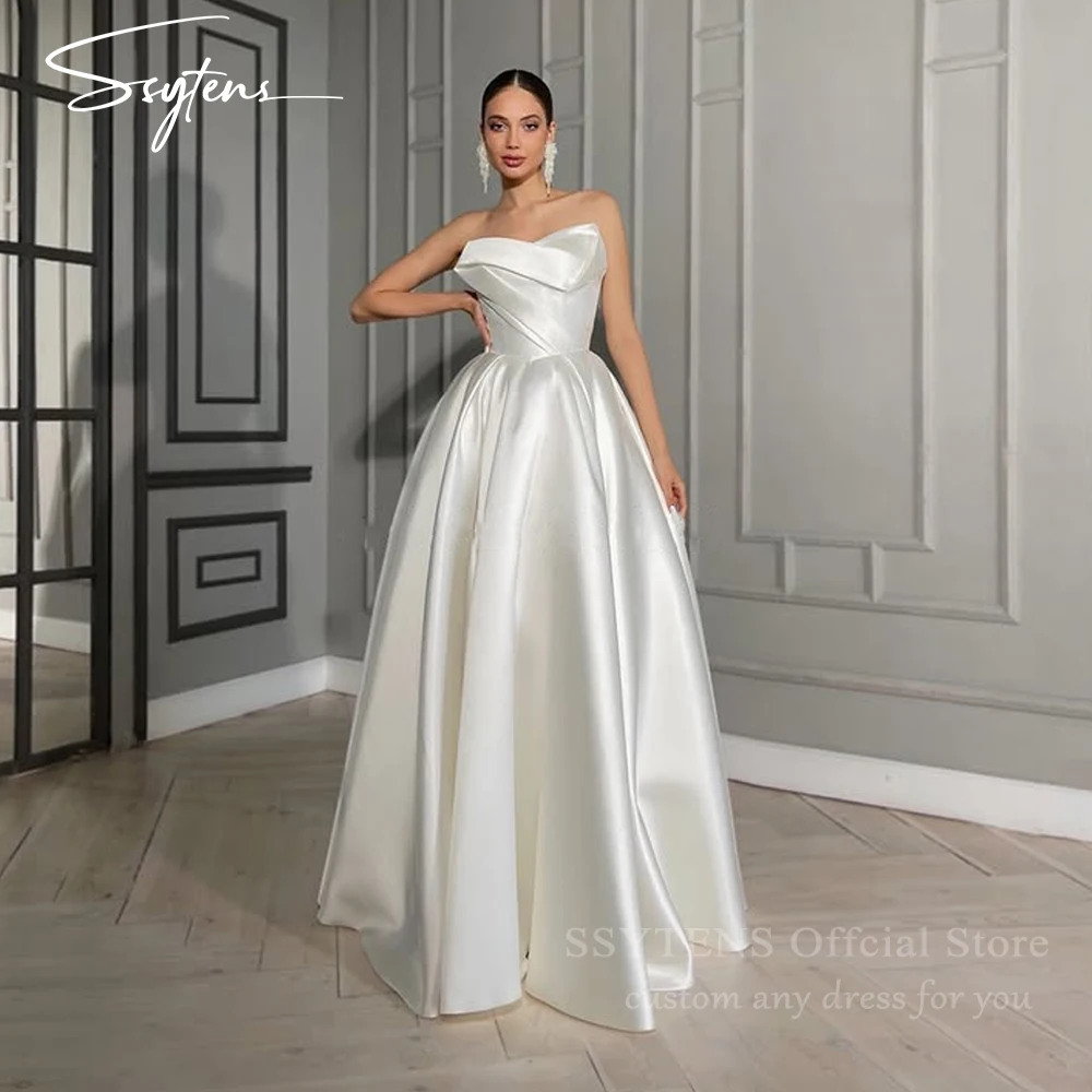 SSYTENS Elegante A-Linie Satin Brautkleider Ärmellose Brautkleider Dubai Maßgeschneidertes trägerloses Braut-Abschlussball-Abend-Partykleid