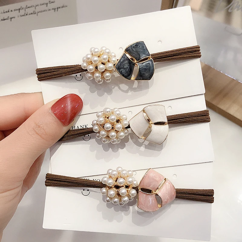 

Korean version of pearl clover hair elastic band net celebrity style cute simple leather case forest hair ring headdress