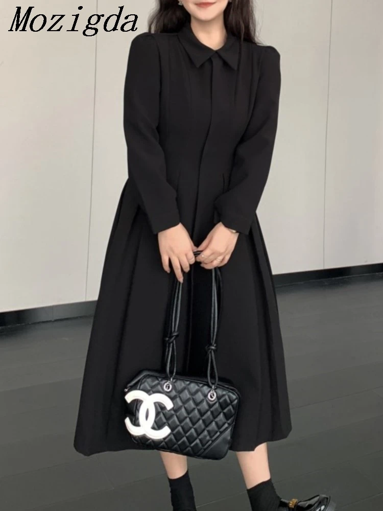 فستان قميص أسود كبير الحجم للتخسيس على طراز هيبورن بتصميم فرنسي كاجوال أنيق بأكمام طويلة وياقة بولو وخصر منخفض على شكل حرف A #1