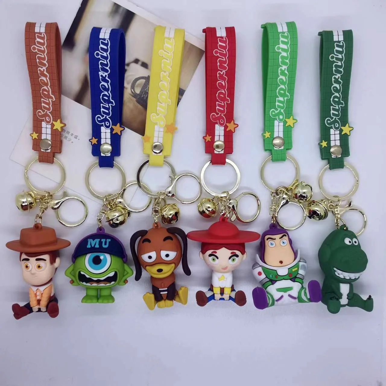 

New Creative Cartoon Sitting Posture Toy Mobilization Keychain Bag Car Keychain Accessories Gift Kawaii Cute Personalized Gifts