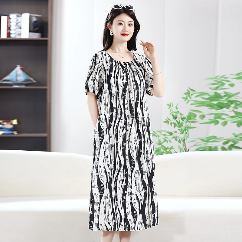 

Новое летнее платье миди из хлопка и шелка с цветочным принтом для женщин среднего возраста, свободного кроя, с длинным рукавом и круглым вырезом, из искусственного хлопка.