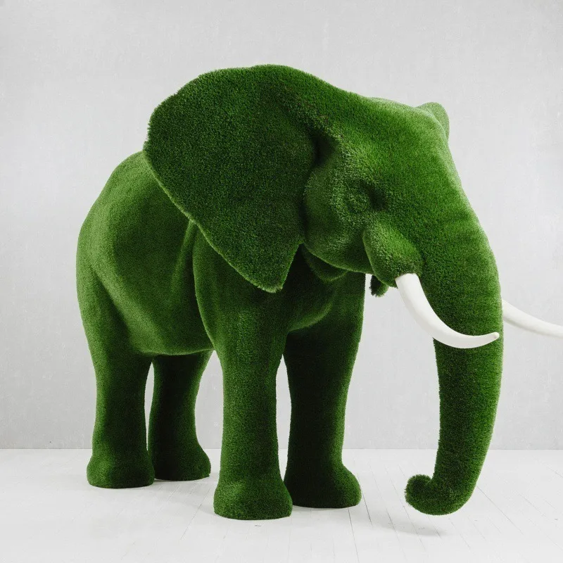 

Simulation of elephant planting, outdoor sculpture, forest view, flower garden public goods