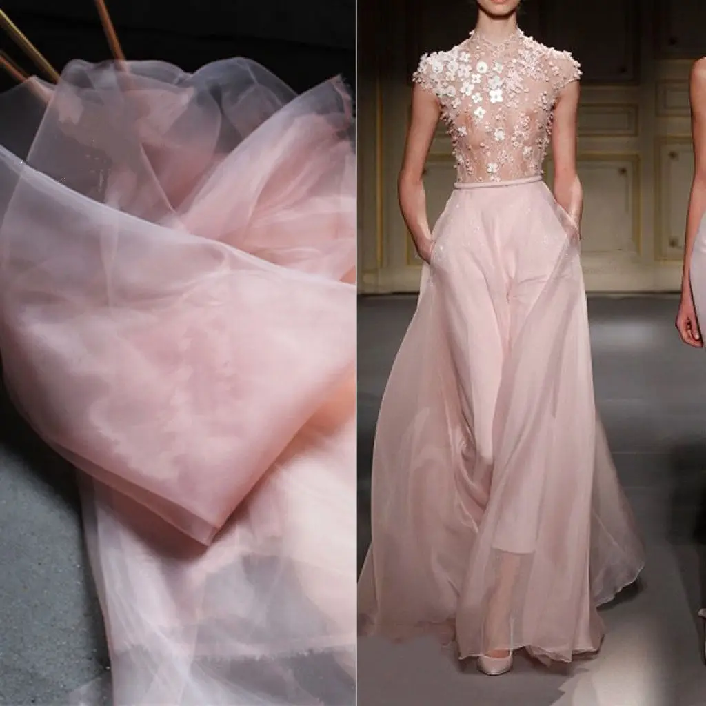 

Iridescent crystal net fabric. Suitable for use in the fabrics of wedding and formal dress designers