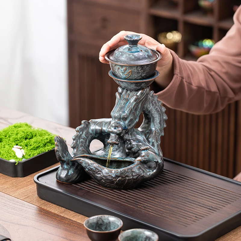 

Для 1 набора вращающегося чайника, керамическая печь превращается в набор чайников Феникс и благоприятный, полуавтоматический чайный сервиз, ленивый кунг-фу чай