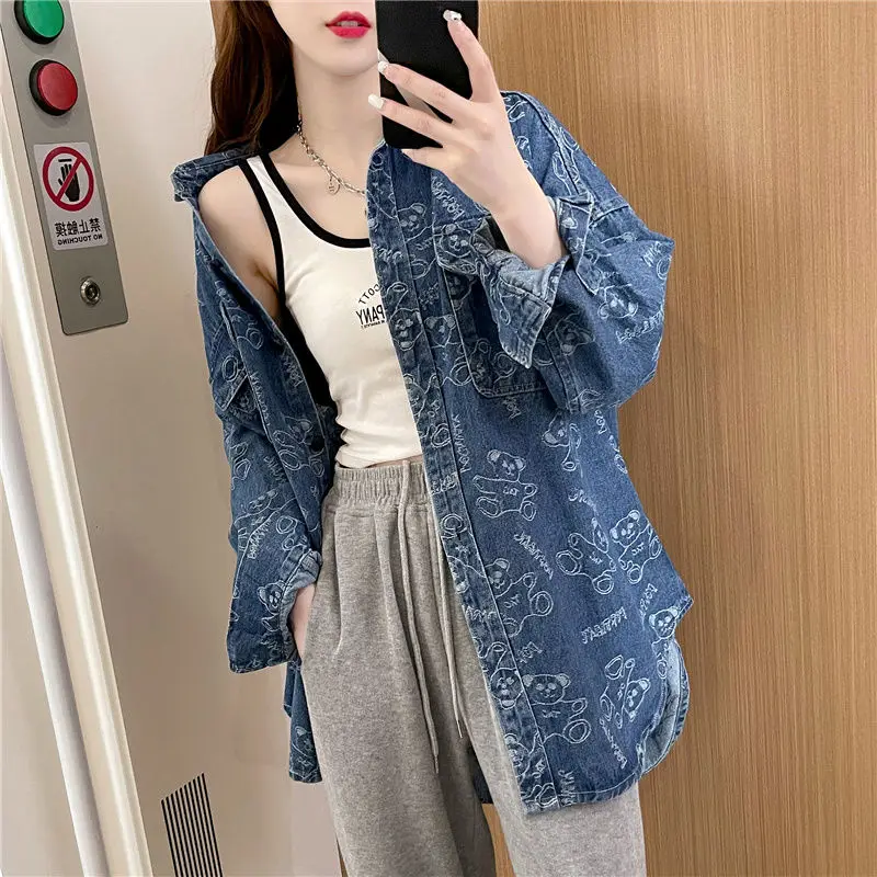 Fashion Lapel Spliced Pockets Irregular Printed Shirt Female Clothing 2023 Autumn Winter New Casual Tops Asymmetrical Blouse