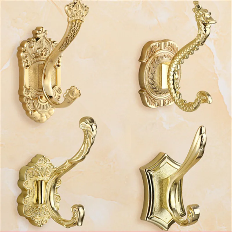gancho-de-parede-dourado-esculpido-para-roupas-toalhas-chaves-chapeus-e-bolsas-aluminio-ideal-para-banheiro-e-cozinha