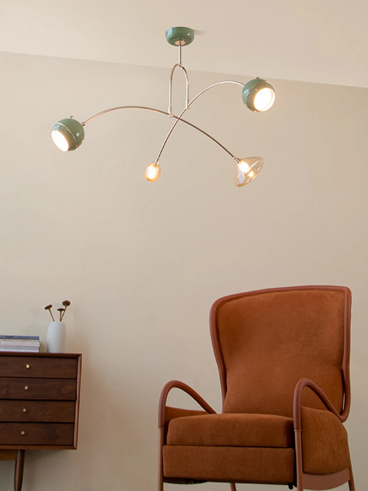 Calder chandelier, sage green living room