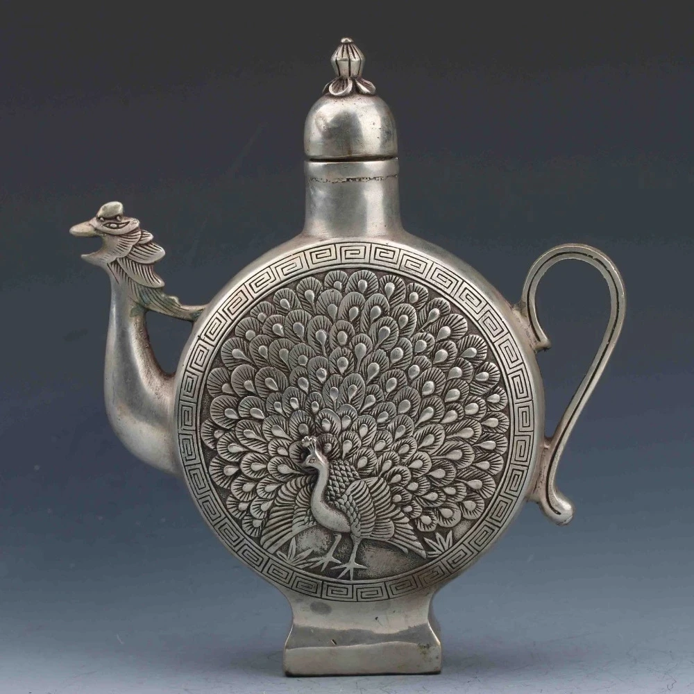 

Details about COLLECTIBLE CHINESE SILVER COPPER HANDWORK PEACOCK TEAPOT