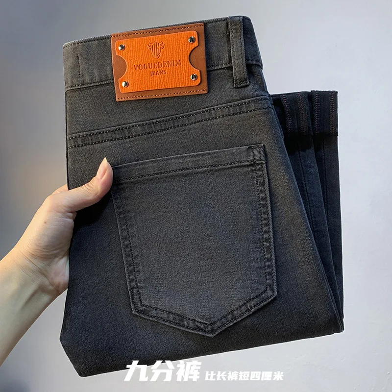กางเกงยีนส์สีดำทรงตรงเล็ก สไตล์หรูหรา ระดับไฮเอนด์ สำหรับผู้ชาย รุ่นใหม่ล่าสุดประจำฤดูใบไม้ร่วงปี 2025 ทรงเข้ารูป สวมใส่ได้หลากหลาย สไตล์ลำลอง ความยาว 9 ส่วน